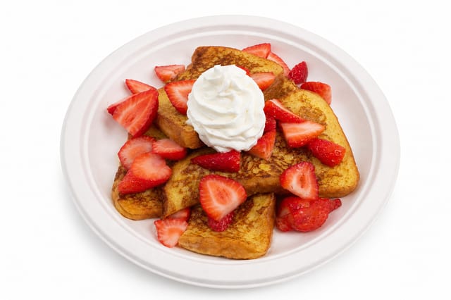 French Toast with Strawberries and Whipped Cream.